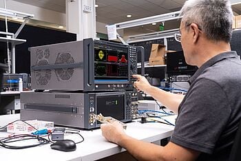 Engineer using testing equipment.