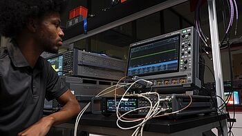 Engineer using testing equipment.