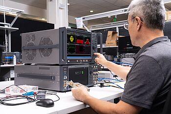 Engineer using testing equipment.