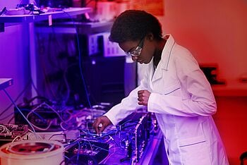 Engineer using testing equipment.