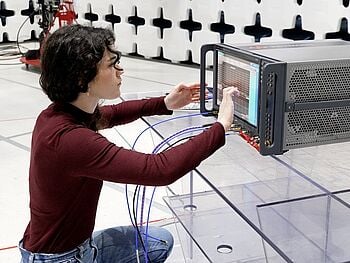 Engineer using testing equipment.