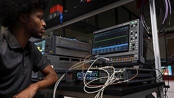 Engineer using testing equipment.