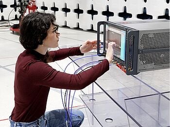 Engineer using testing equipment.