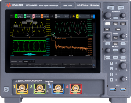 Front panel of the Keysight InfiniiVision HD304MSO mixed signal oscilloscope, showing a touchscreen display with waveform, histogram, and FFT plots, alongside horizontal, trigger, marker, and vertical control knobs and four input channel connectors.