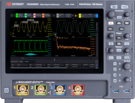 Front panel of the Keysight InfiniiVision HD304MSO mixed signal oscilloscope, showing a touchscreen display with waveform, histogram, and FFT plots, alongside horizontal, trigger, marker, and vertical control knobs and four input channel connectors.