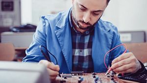 Engineer testing circuits